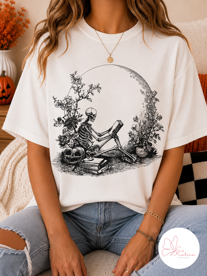 Spooky Bookworm Skeleton Graphic Tee